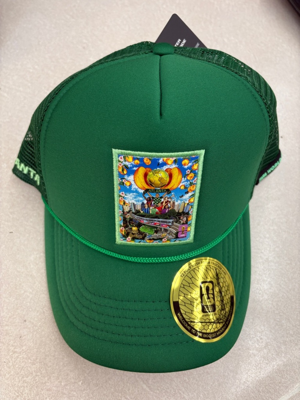World Cup Green Trucker Hat with Colorful Atlanta Patch